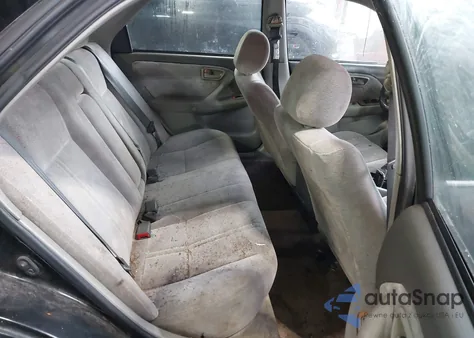 1997 Toyota Camry Le z USA, uszkodzony, nr VIN JT2BG22K5V0021599